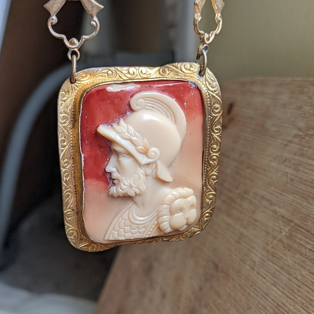 Vintage Hattie Carnegie Costume Jewelry Cameo. Similar Cameos have sold for $90.